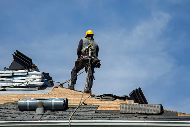 Professional Roofing technician working in Pennville, IN